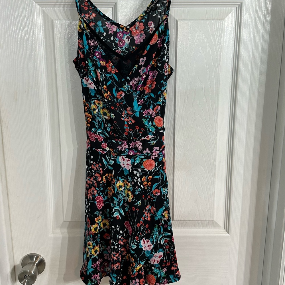 Express frilly romper with flowers size small